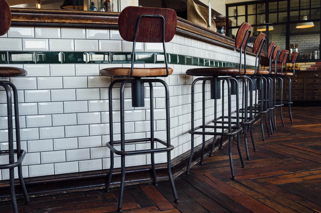 Wood bar counter with chairs