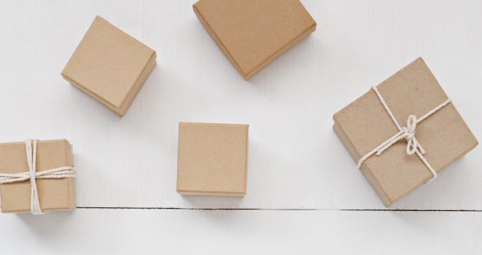 Brown cardboard boxes on a white floor